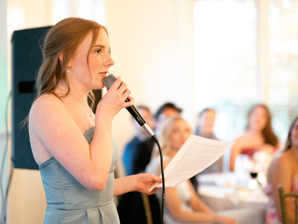 sister with red hair giving speech at payne corley house